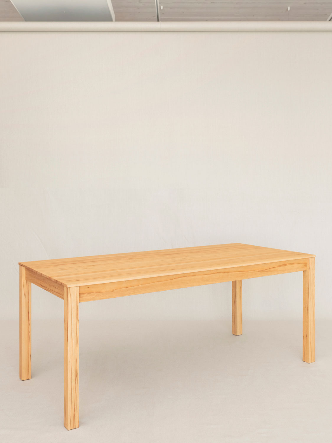 Ausziehbarer Esstisch Flava in Kernbuche massiv, 180 x 85 cm